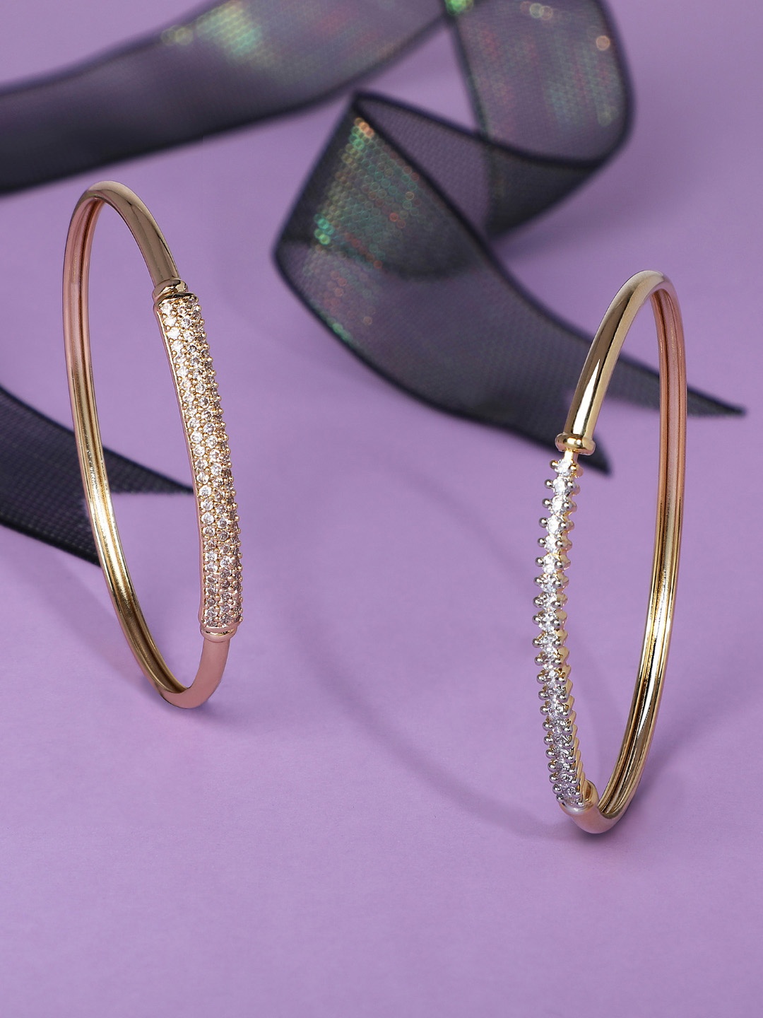

Zaveri Pearls Women Gold-Toned & White Brass Cubic Zirconia Kada Bracelet