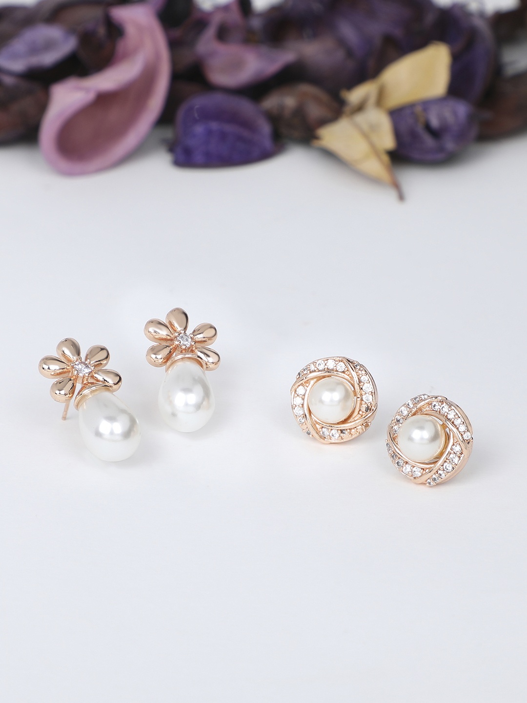 

Zaveri Pearls Rose Gold Contemporary Studs Earrings