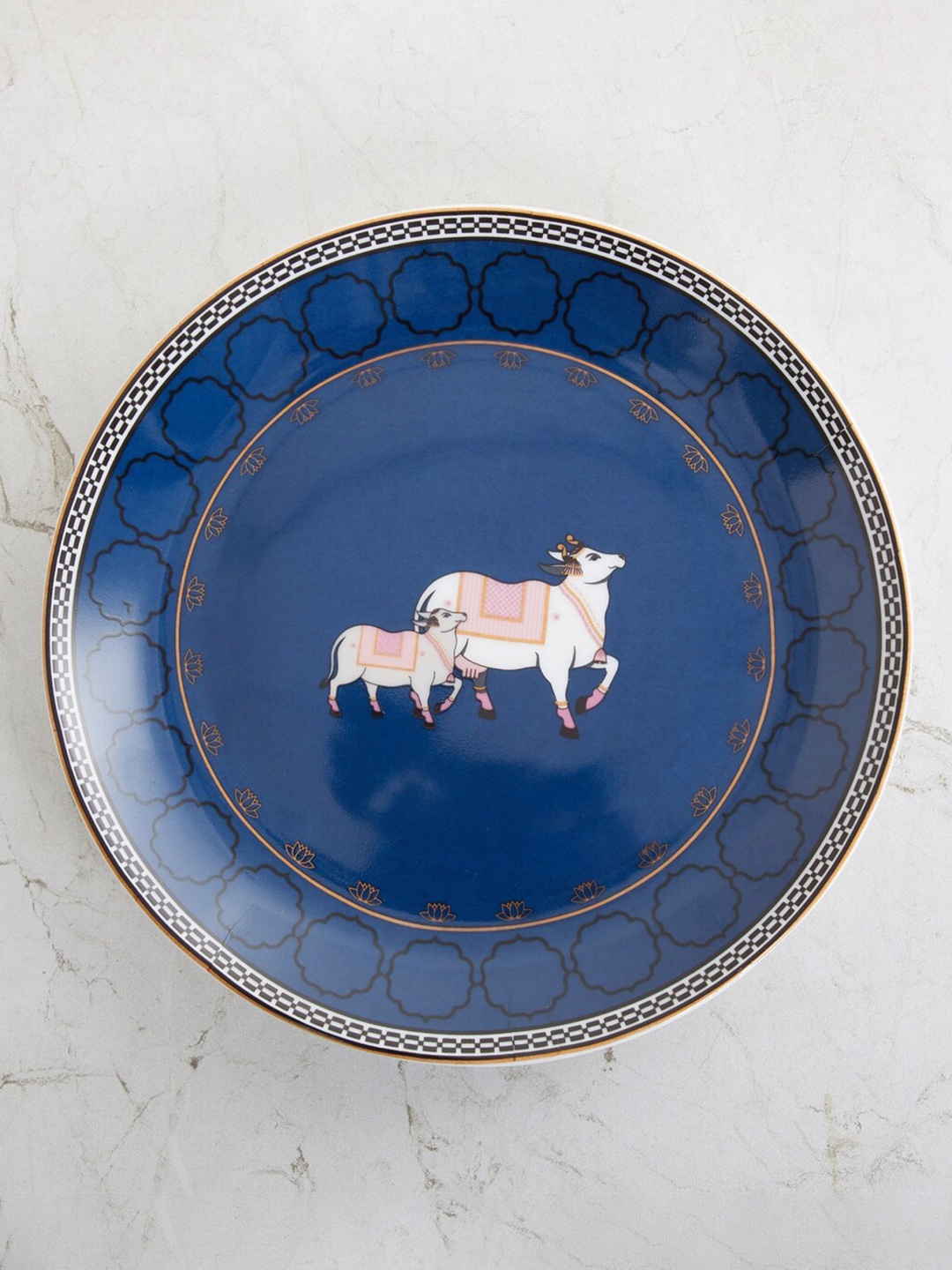 

Home Centre Blue Cow & Calf Printed Bone China Side Plate