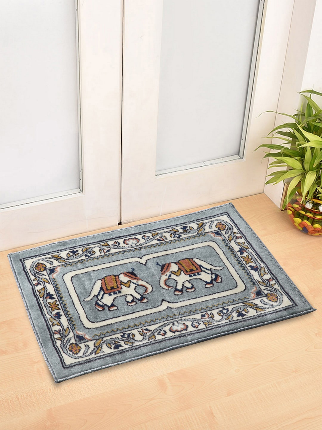 

Arrabi Set Of 2 Blue & Off-White Ethnic Motifs Synthetic Floor Mats