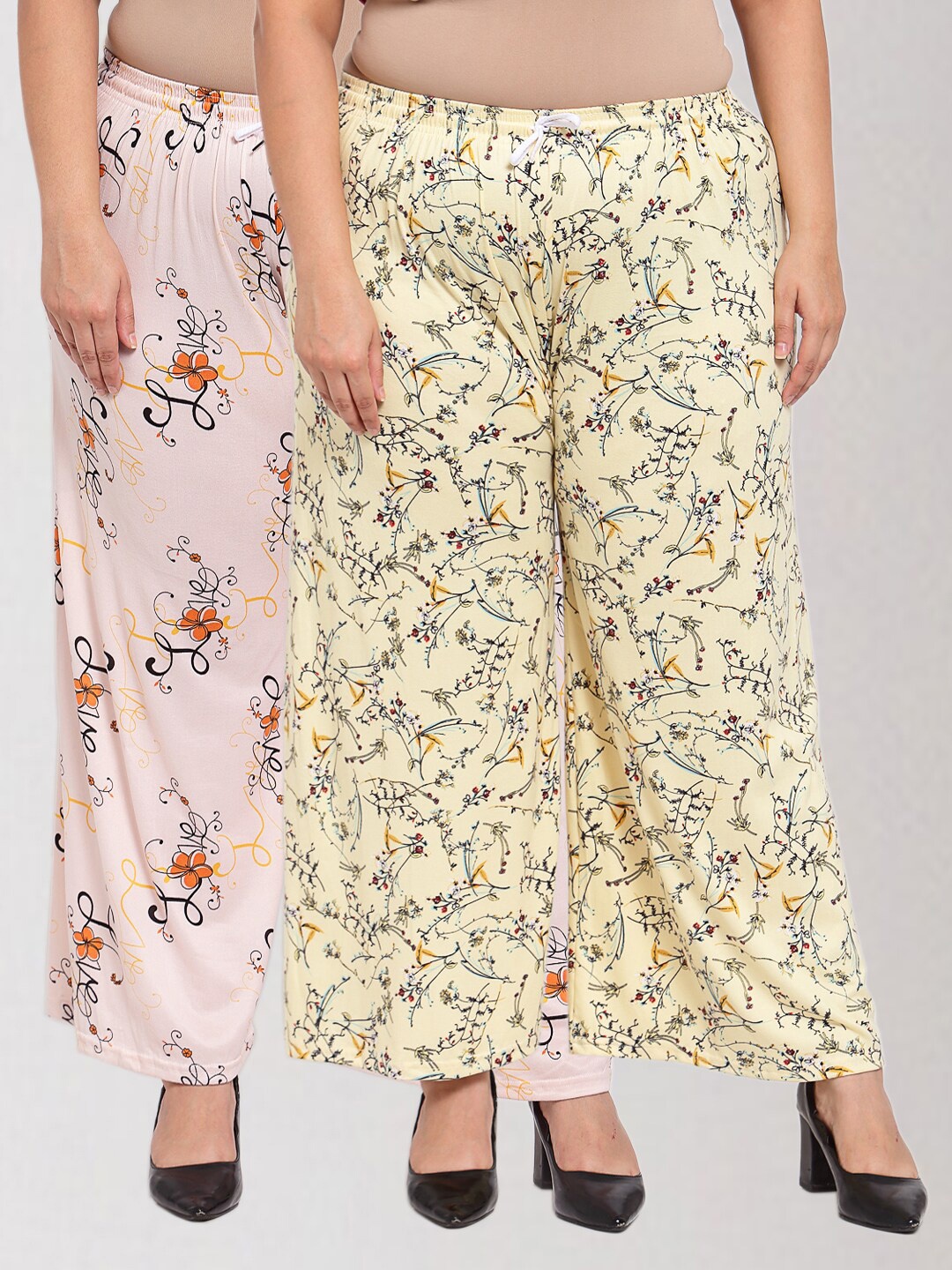 

KLOTTHE Women Pack Of 2 Cream-Coloured & Pink Floral Printed Palazzos