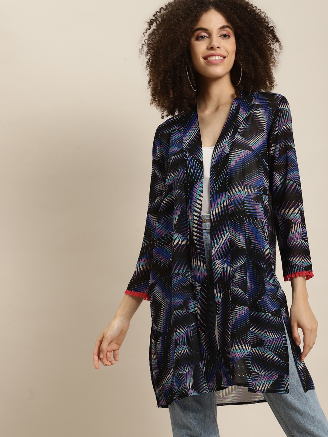 

Qurvii Women Black & Blue Printed Tasselled Longline Shrug