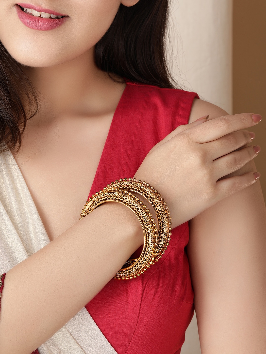 

Anouk Woman Anouk Gold Plated Intricate Work and Beads Set of 2 Bangles