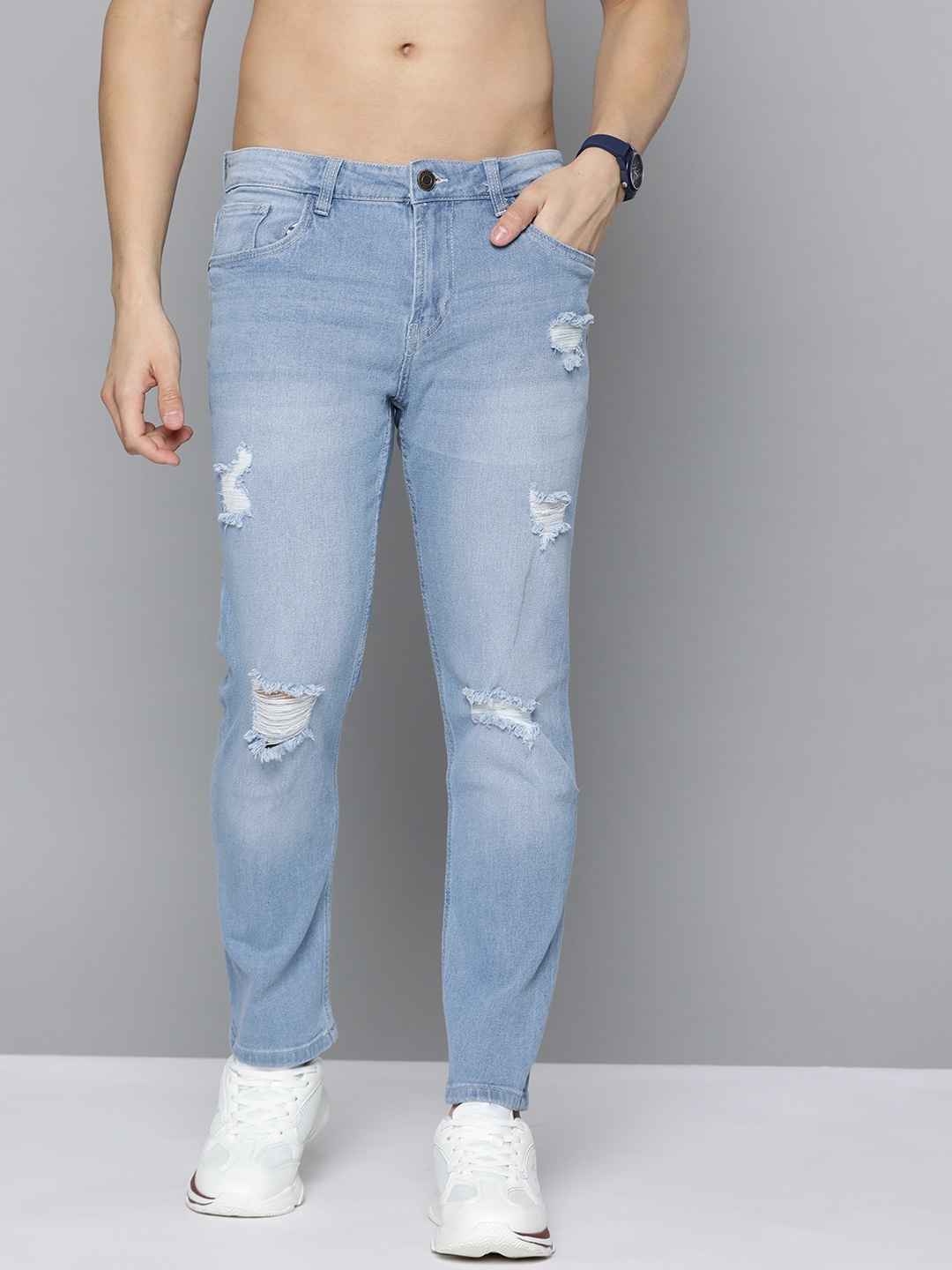 

Harvard Men Blue Cropped Tapered Fit Mildly Distressed Light Fade Stretchable Jeans