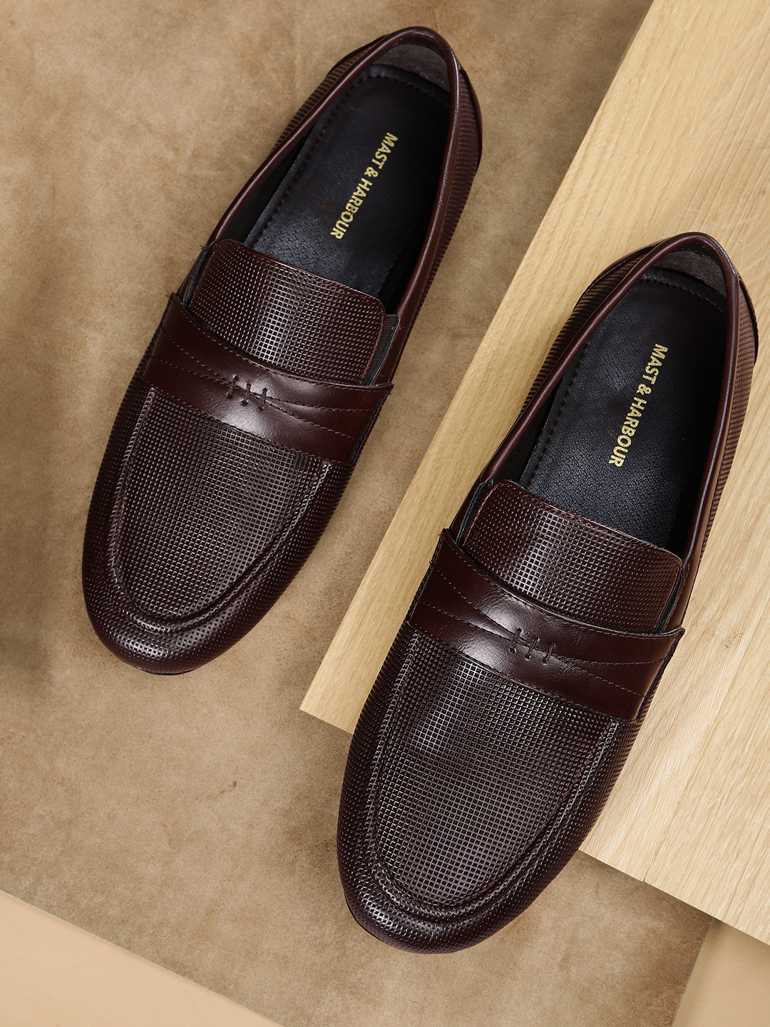 

Mast & Harbour Men Burgundy Textured Loafers