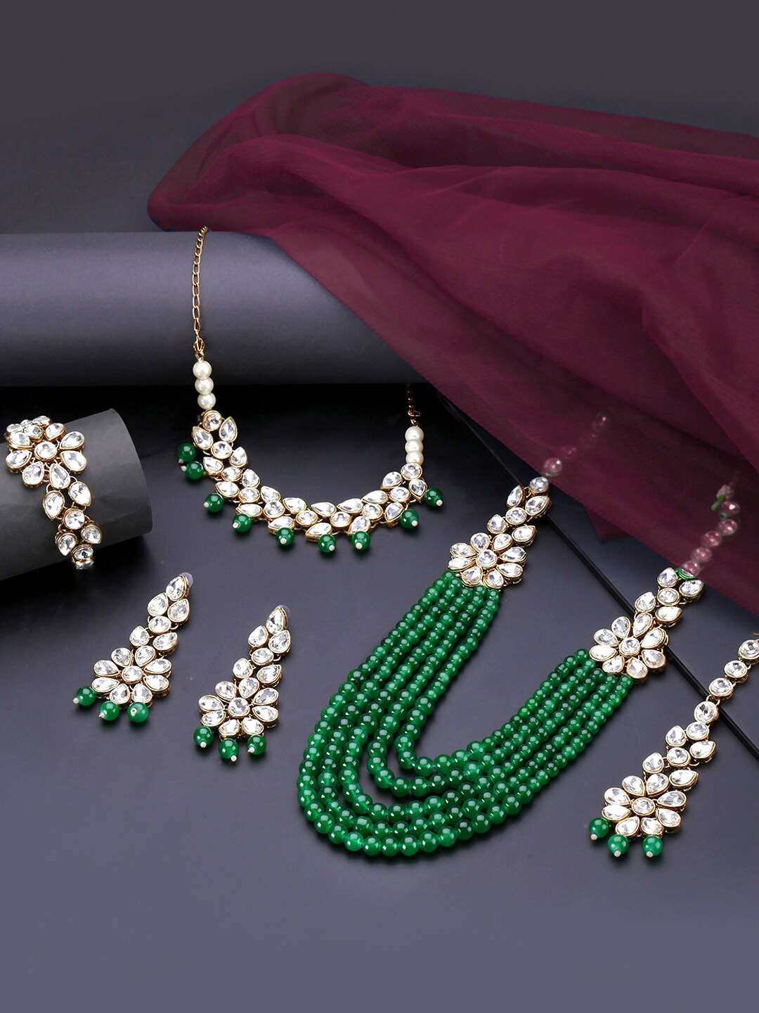 

Yellow Chimes Women Gold-Toned & Green Kundan Stone Studded Layered Bridal Jewellery Set