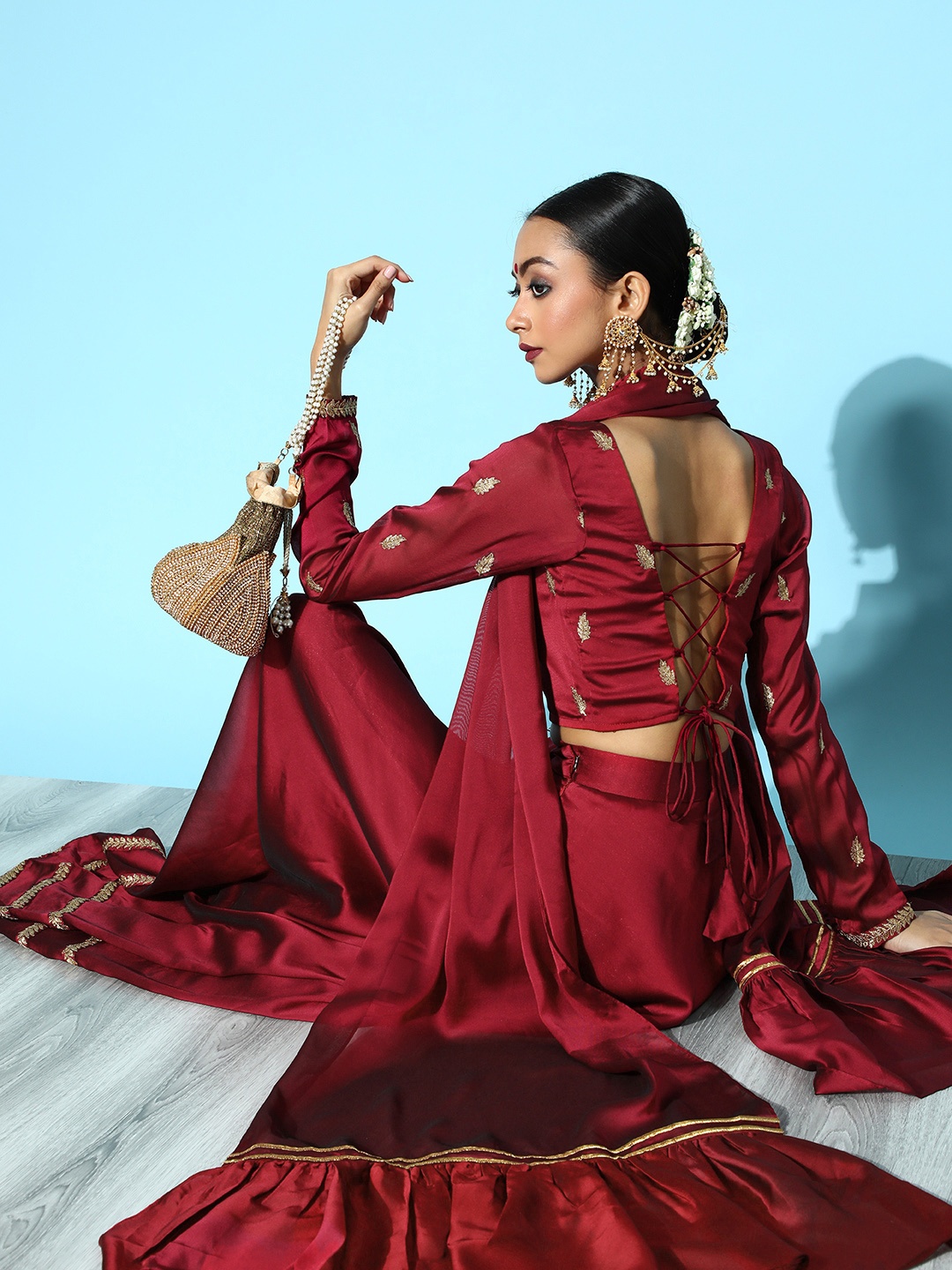 

Inddus Attractive Maroon Woven Design Unstitched Lehenga Choli with Dupatta