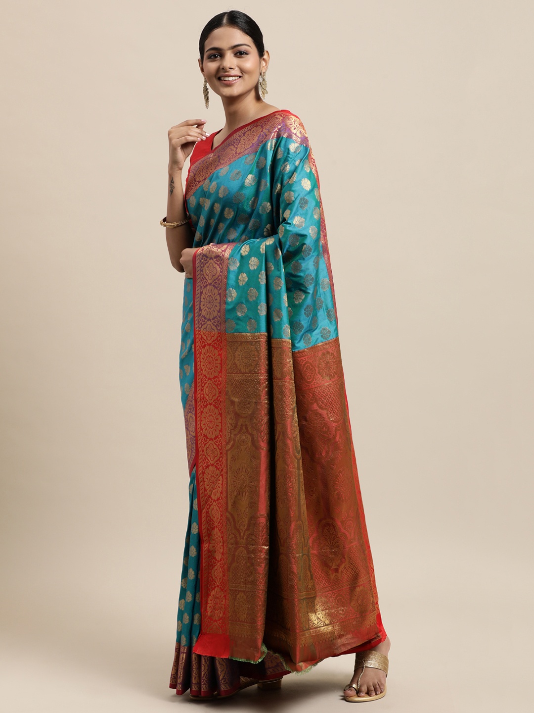 

Mitera Turquoise Blue & Orange Ethnic Motifs Zari Silk Cotton Banarasi Saree