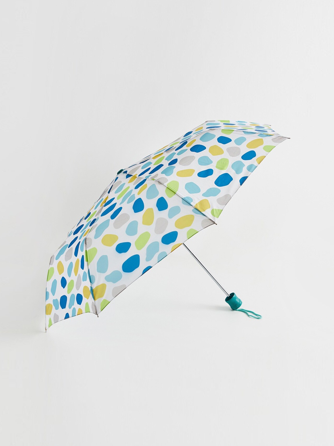 

Home Centre White & Yellow Pebbles Printed Manual 3-Fold Umbrella