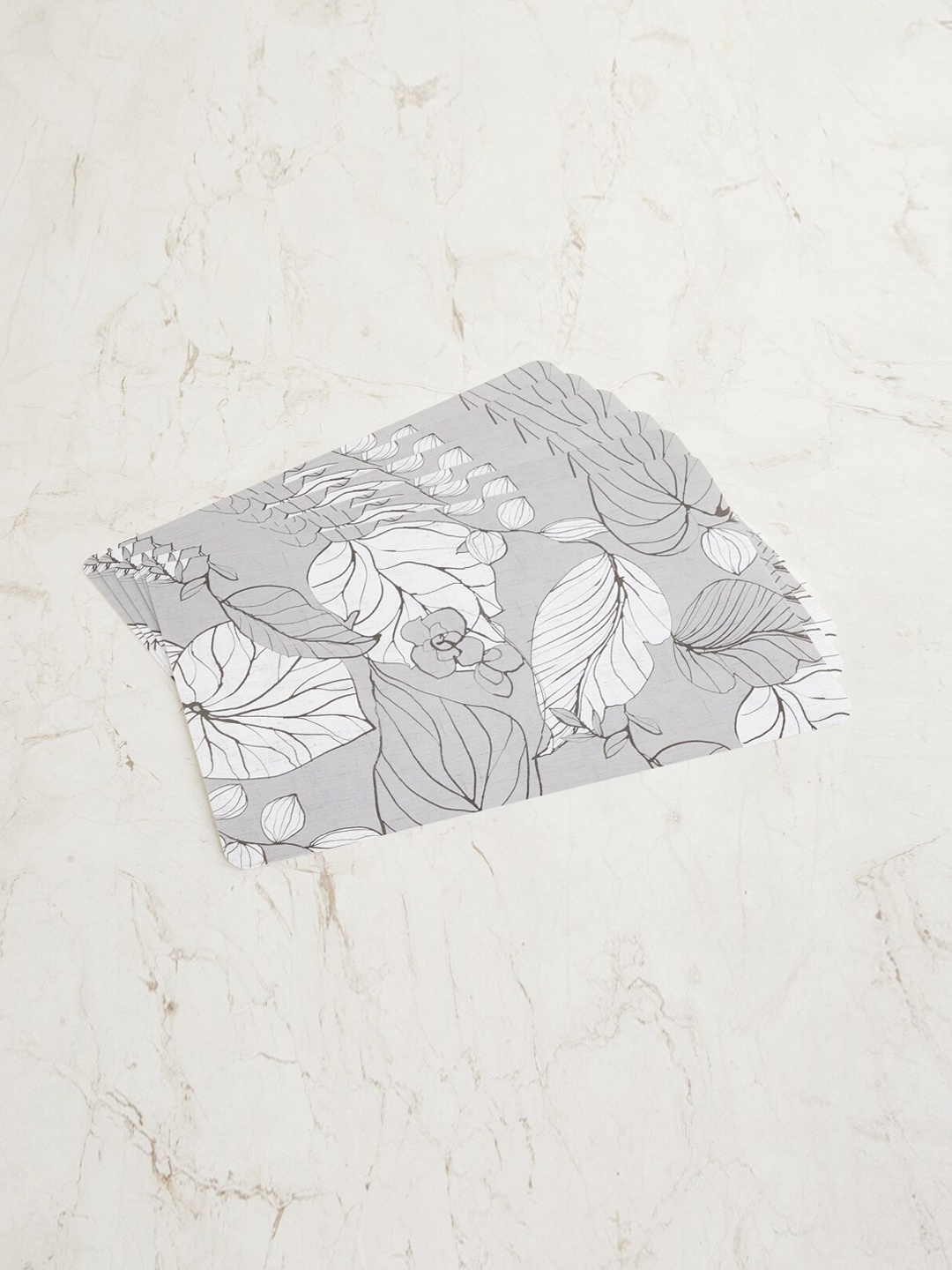 

Home Centre Set Of 6 Grey & White Floral Table Placemats