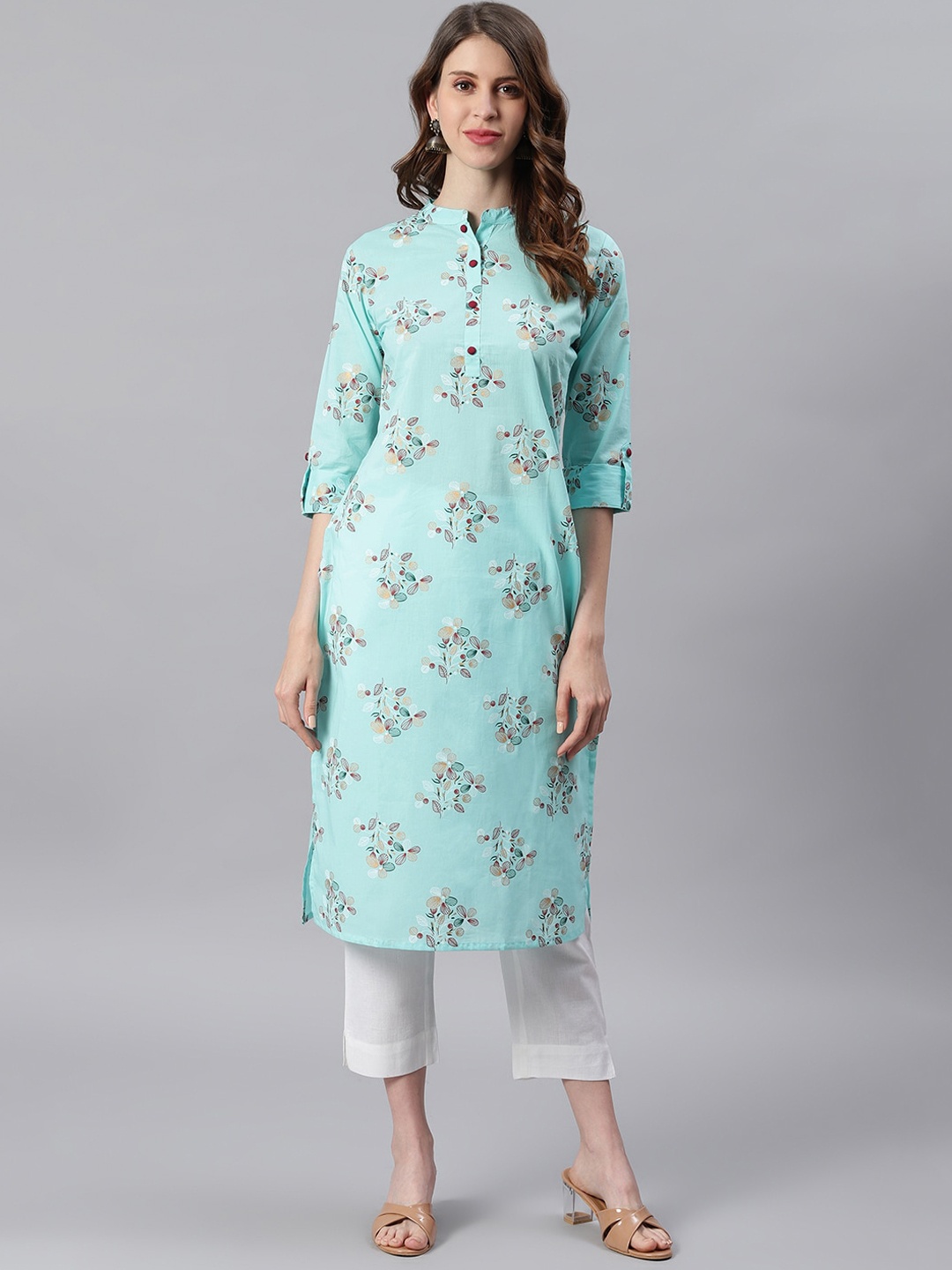 

Janasya Women Turquoise Blue Floral Printed Regular Pure Cotton Kurta with Trousers