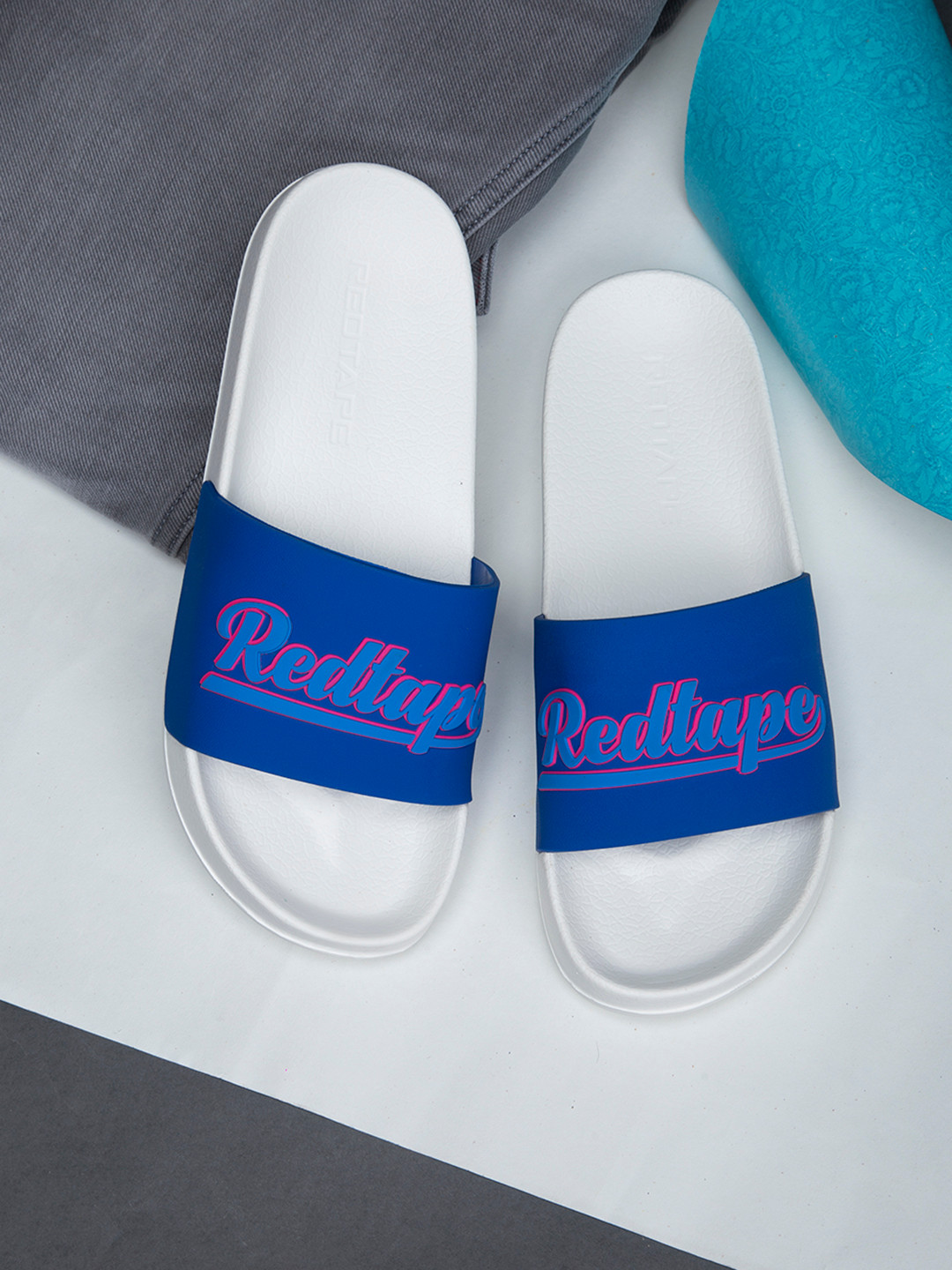 

Red Tape Men Blue & Off White Printed Sliders