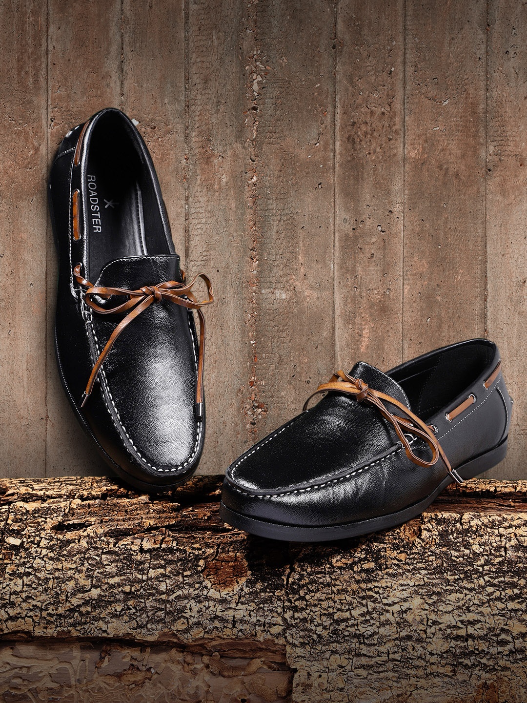 

Roadster Men Black Solid Boat Shoes