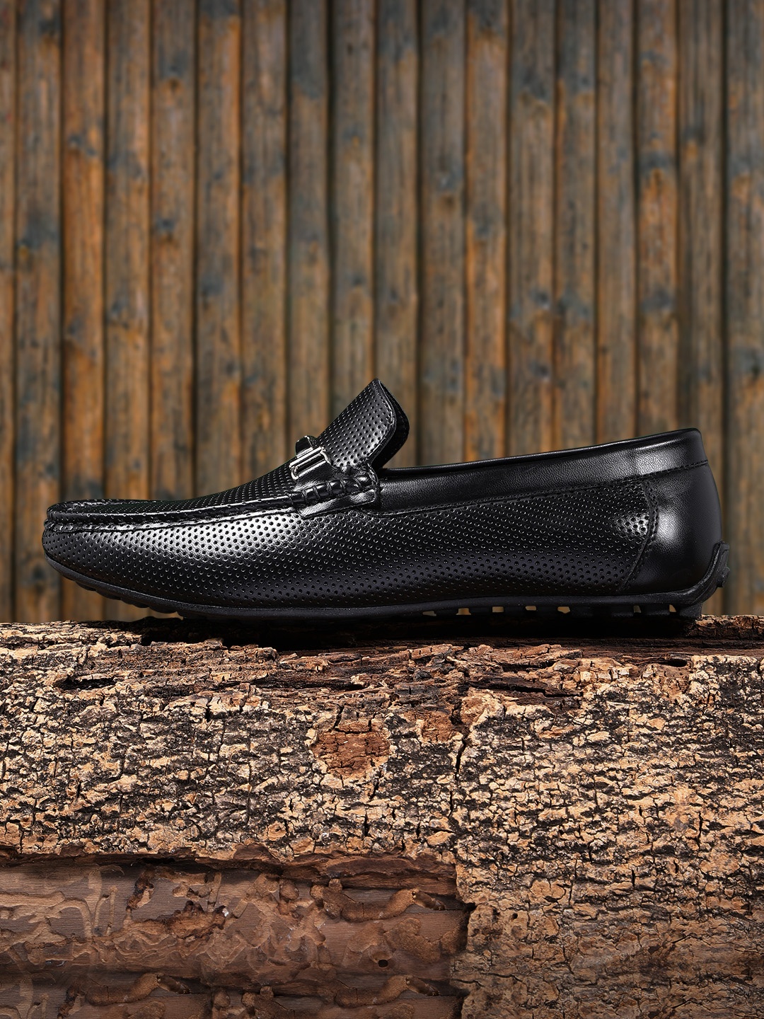 

The Roadster Lifestyle Co Men Black Solid Perforation Textured Loafers