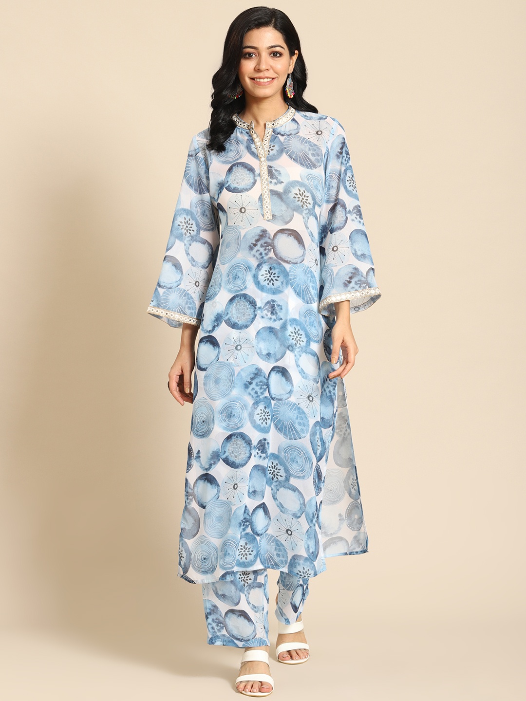 

Prakrti Women Blue Printed Regular Kurta with Palazzos