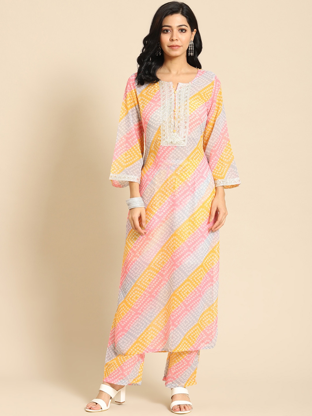

Prakrti Women Orange Printed Regular Kurta with Palazzos