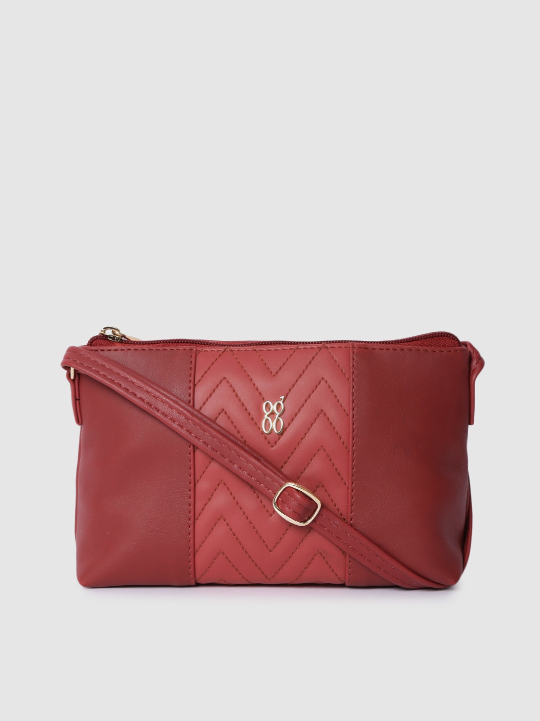 

Baggit Burgundy Colourblocked Structured Sling Bag