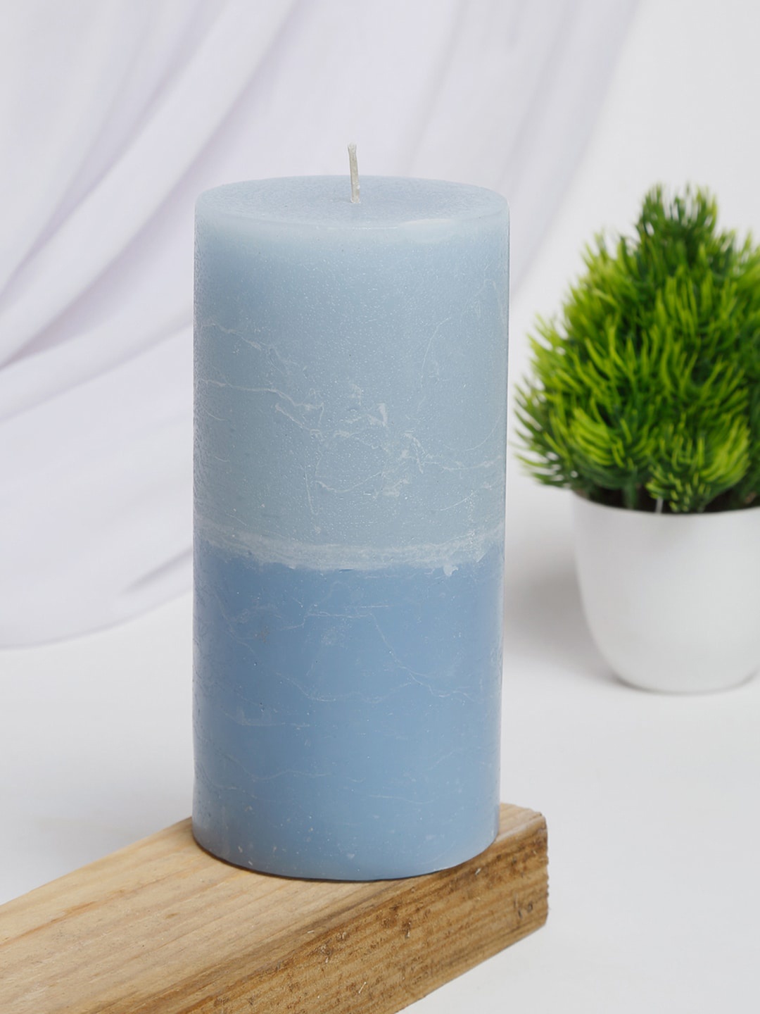 

Fabindia Blue Solid Fragrance Wax Candle