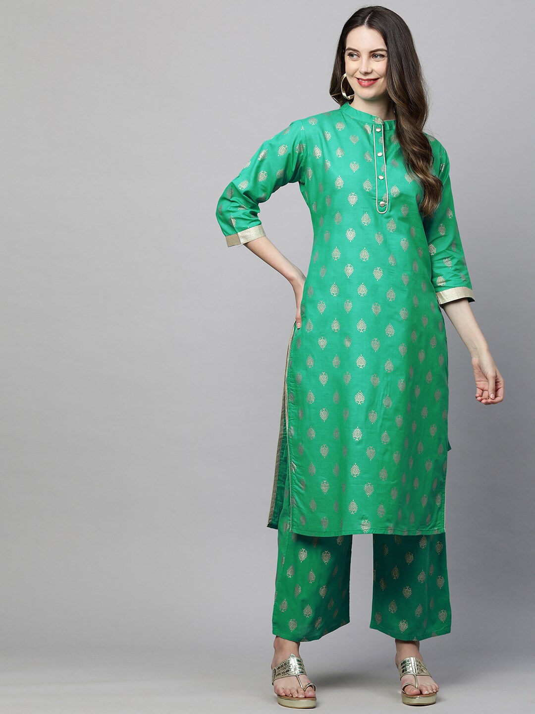 

KALINI Women Sea Green & Gold-Toned Ethnic Motifs Printed Kurta with Palazzos