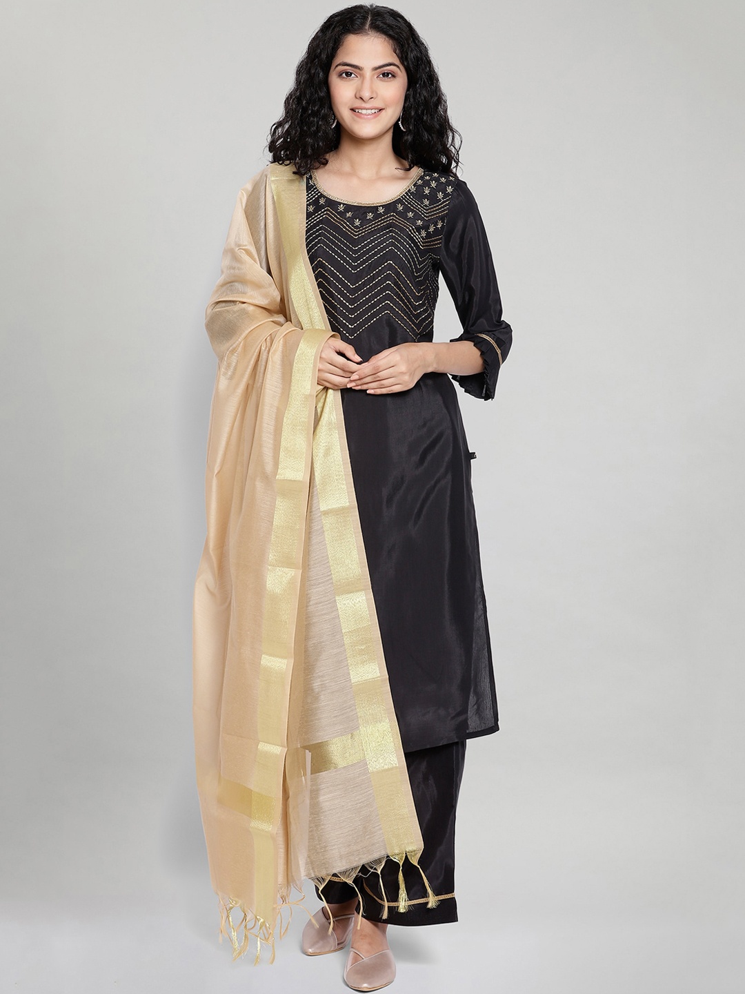 

AURELIA Women Black And Gold Embroidered Regular Kurta with Palazzos & With Dupatta