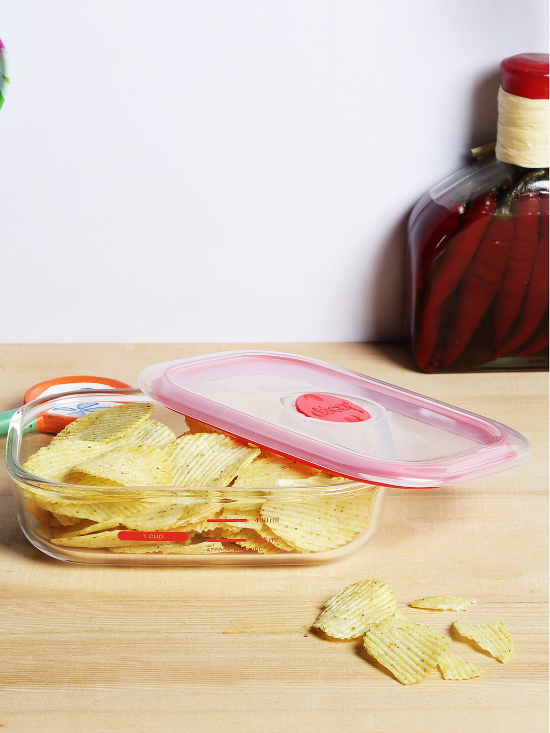 

Decor Transparent & Red Solid Rectangular Food Storage Container With Lid