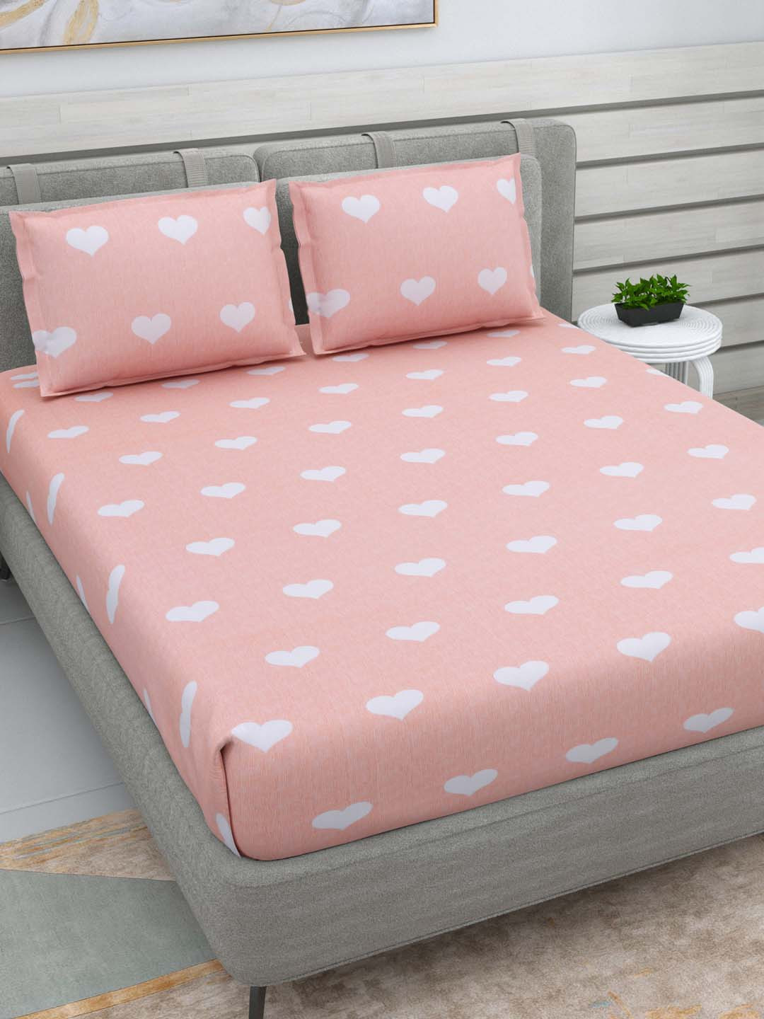 

DREAM WEAVERZ Pink & White Geometric Glazed Cotton 220 TC Queen Bedsheet with 2 Pillow Covers