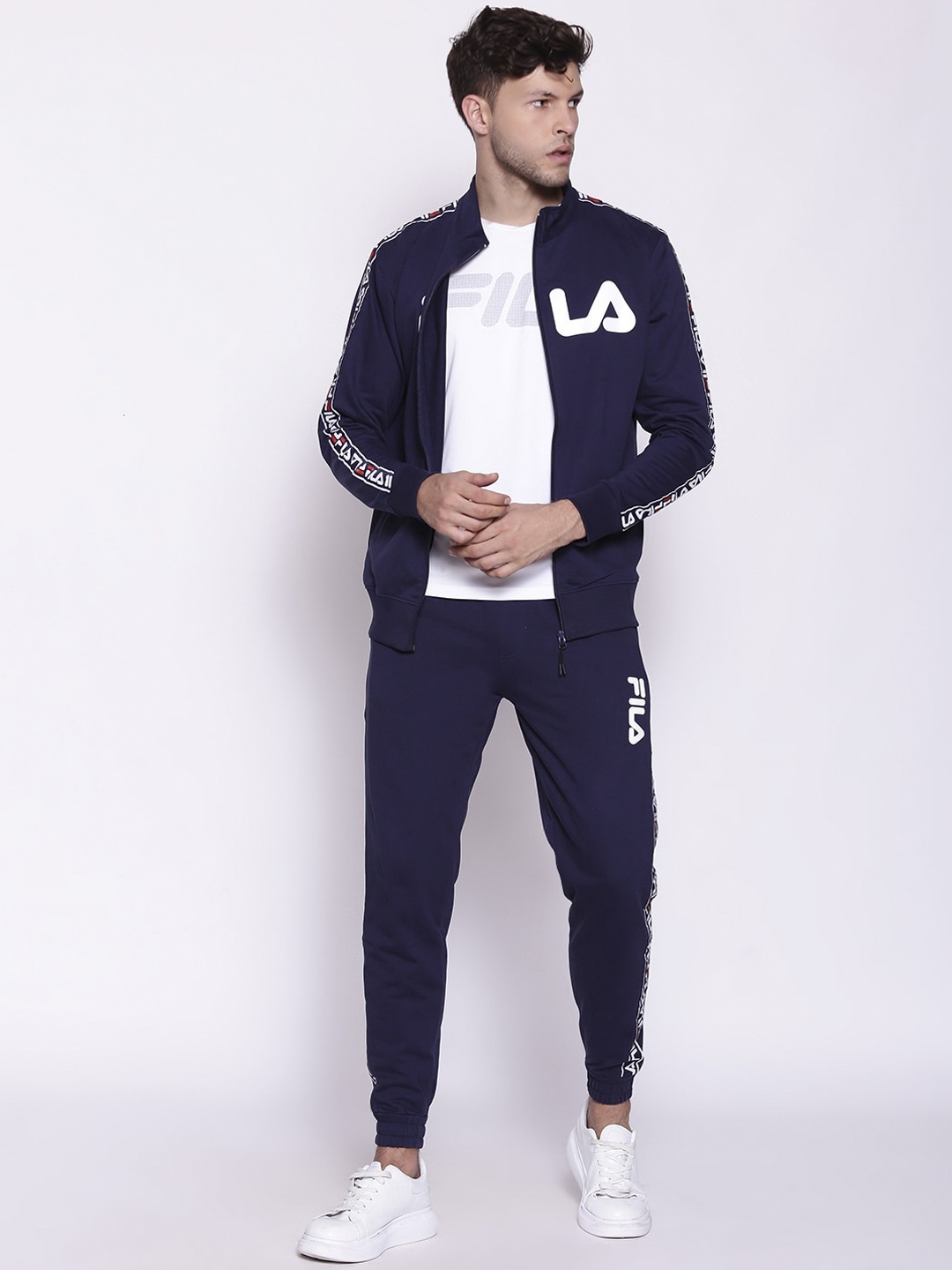 

FILA Men Navy Blue Solid Pure Cotton Tracksuit