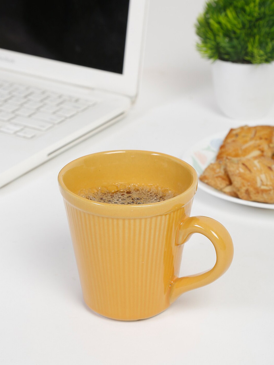 

Fabindia Brown Textured Ceramic Prishti Ribbed Coffee Glossy Mug