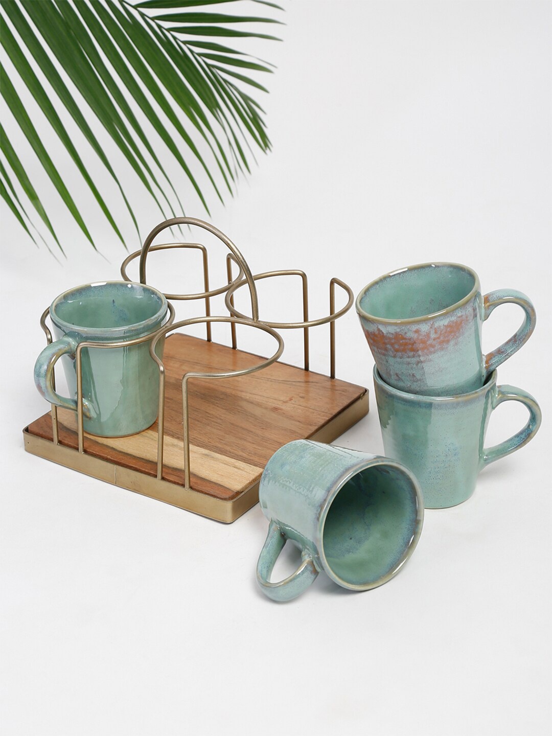 

Fabindia Set of 4 Green Solid Wood Eniya W/Caddy Glazed Ceramic Matte Mugs