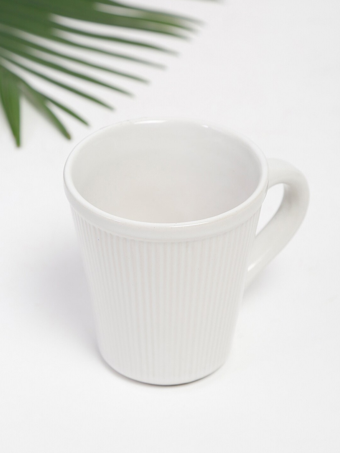 

Fabindia White Textured Ceramic Ribbed Glossy Mug
