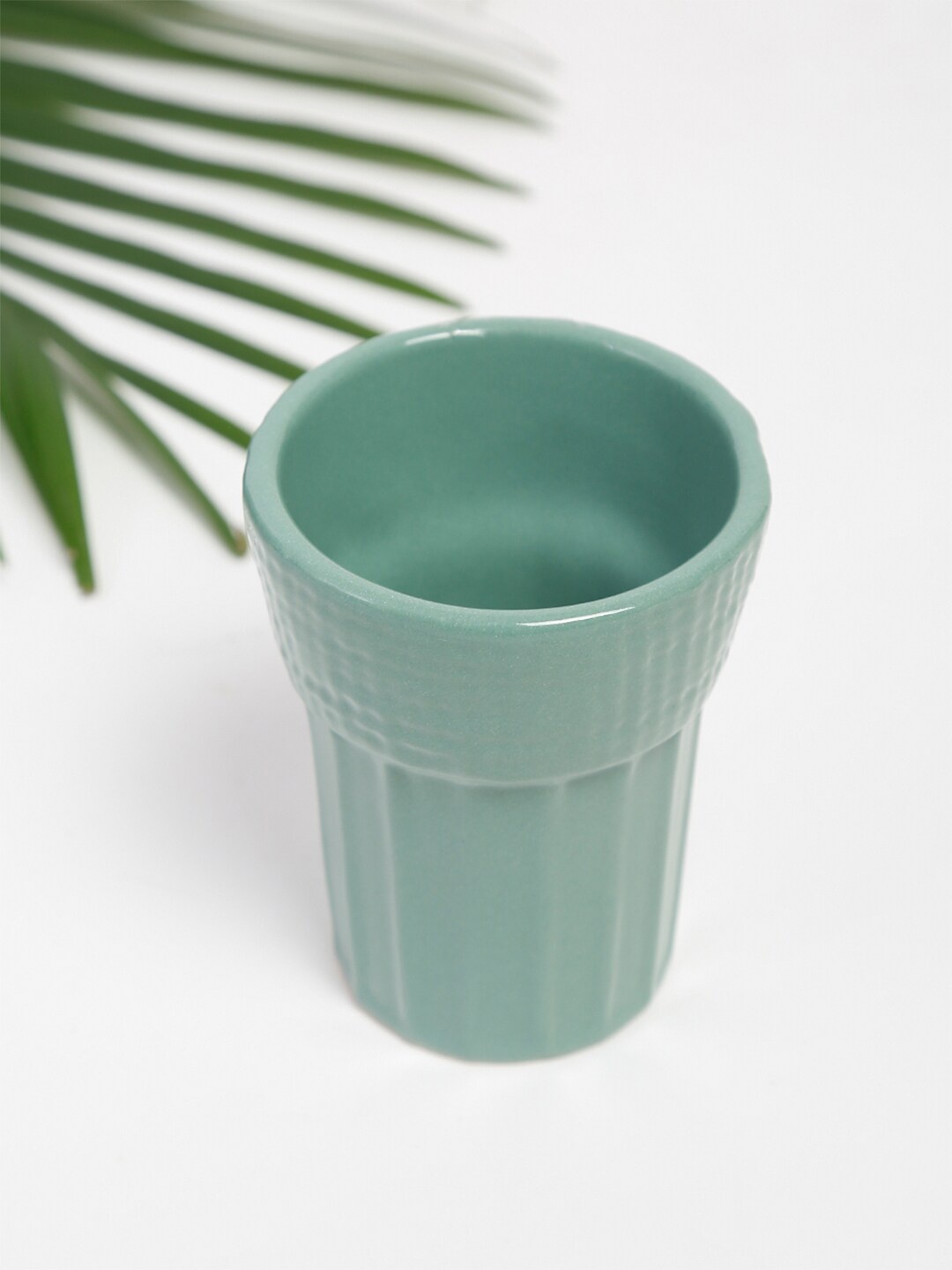 

Fabindia Teal Textured Ceramic Ribbed Glossy Mug