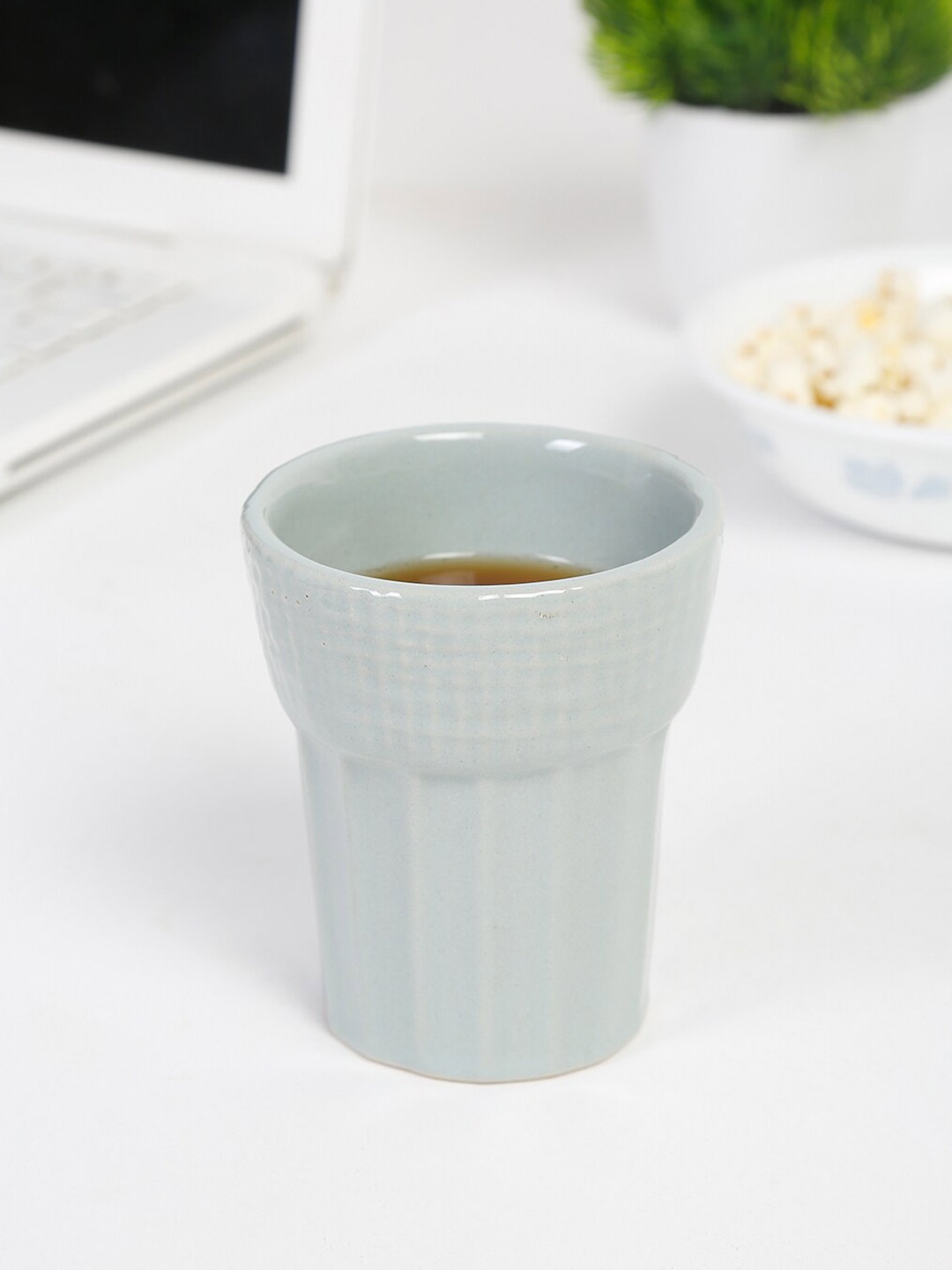 

Fabindia Grey Textured Ceramic Ribbed Glossy Mug