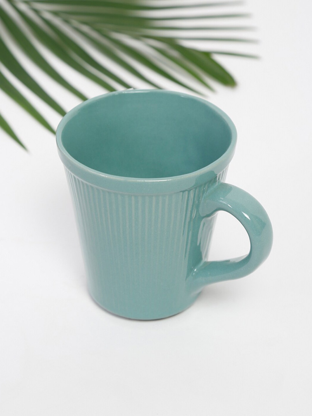 

Fabindia Blue Textured Ceramic Ribbed Glossy Mugs