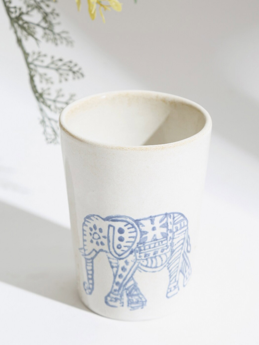 

Fabindia White & Blue Printed Ceramic Glossy Mug