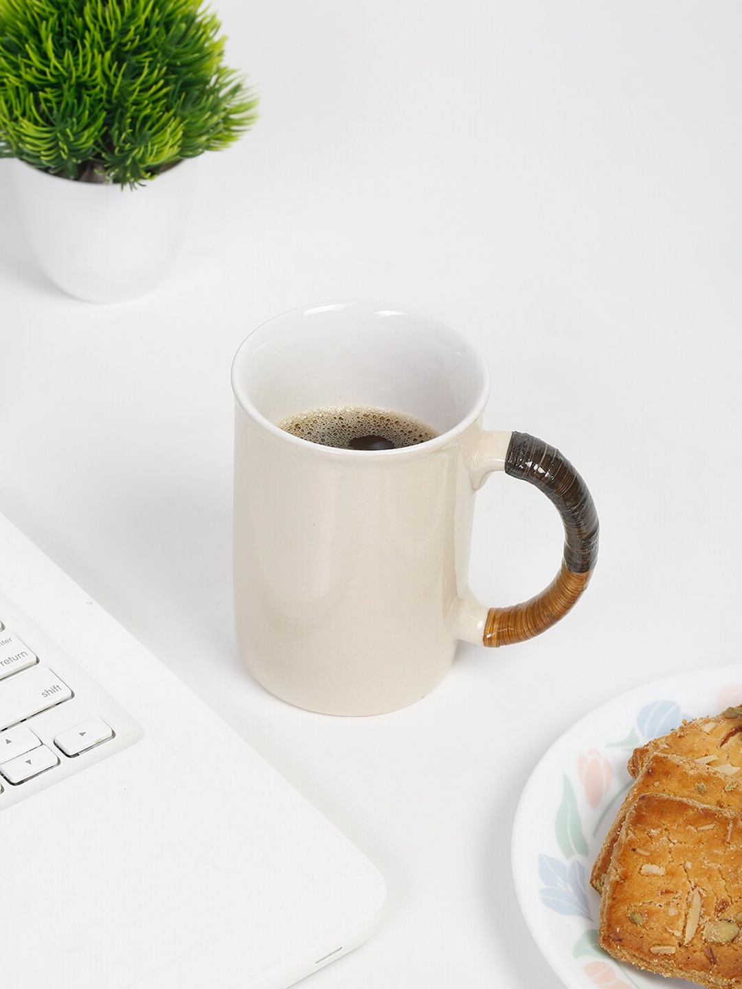 

Fabindia Cream-Coloured Solid Ceramic Matte Mug