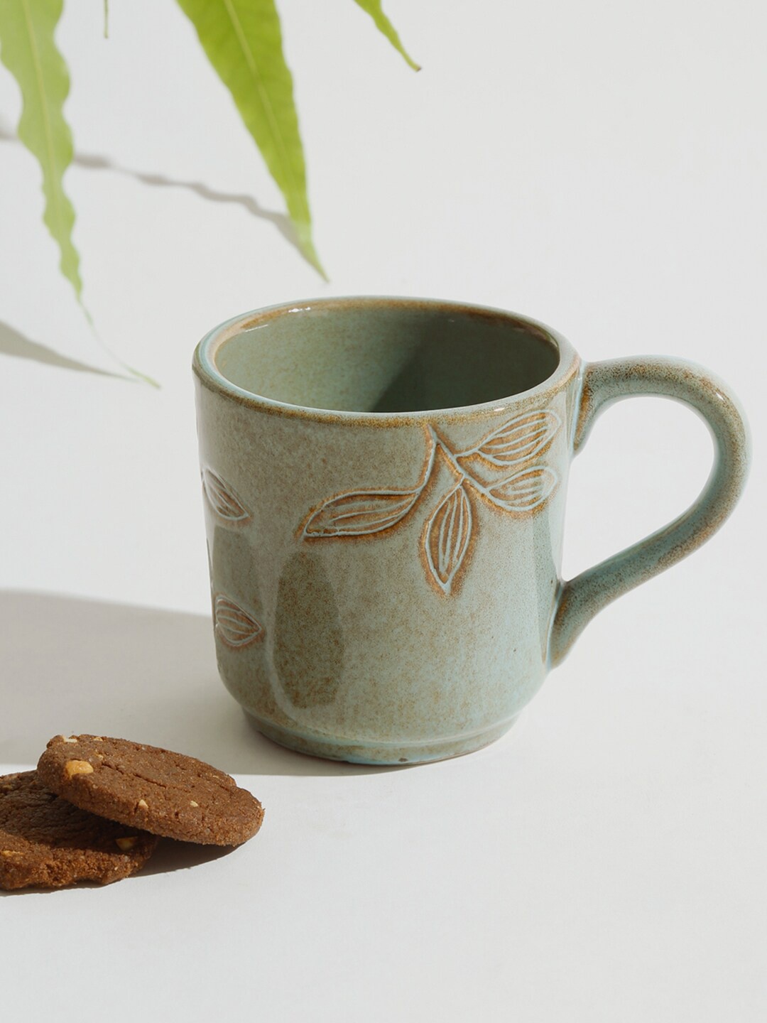 

Fabindia Green & Gold-Toned Printed Ceramic Matte Mug
