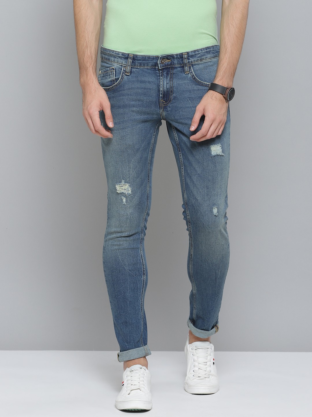 

Indian Terrain Men Blue Slim Fit Low Distress Light Fade Stretchable Jeans
