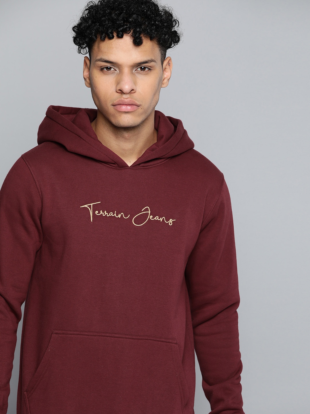 

Indian Terrain Men Maroon Hooded Solid Sweatshirt
