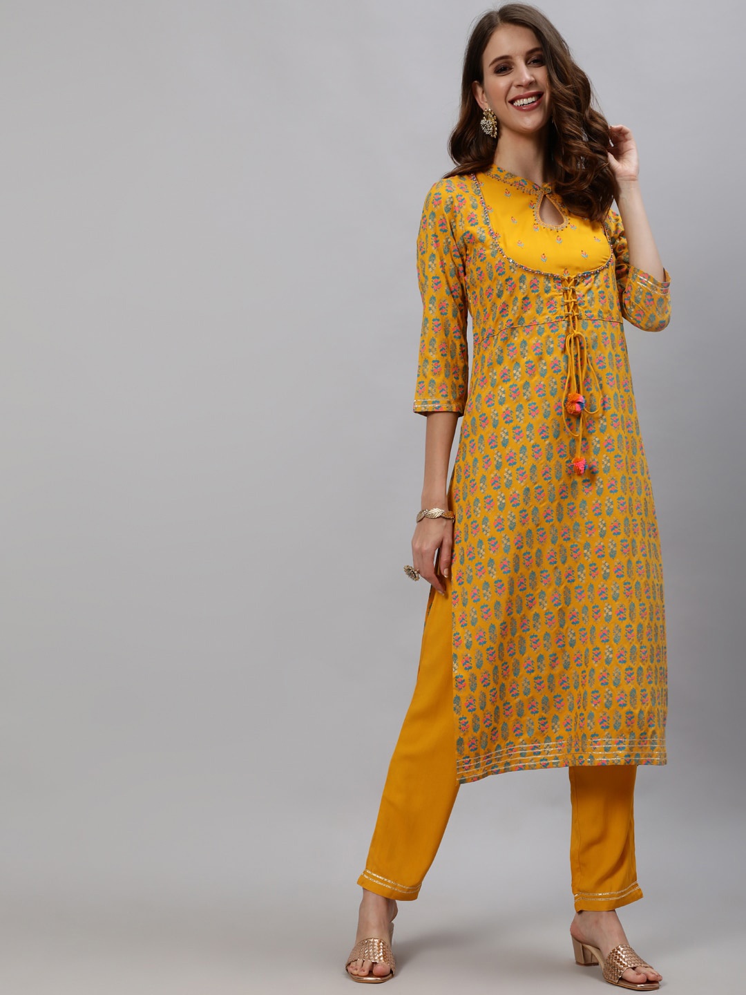 

Anubhutee Women Yellow & Blue Floral Printed Empire Kurta With Trousers