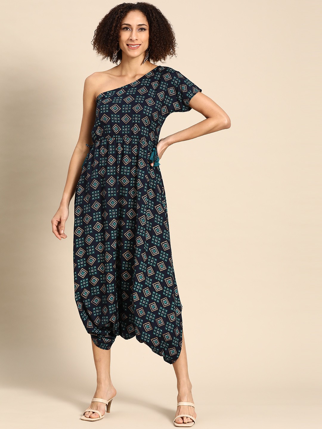 

MABISH by Sonal Jain Navy Blue & Golden One-Shoulder Printed Dhoti Jumpsuit