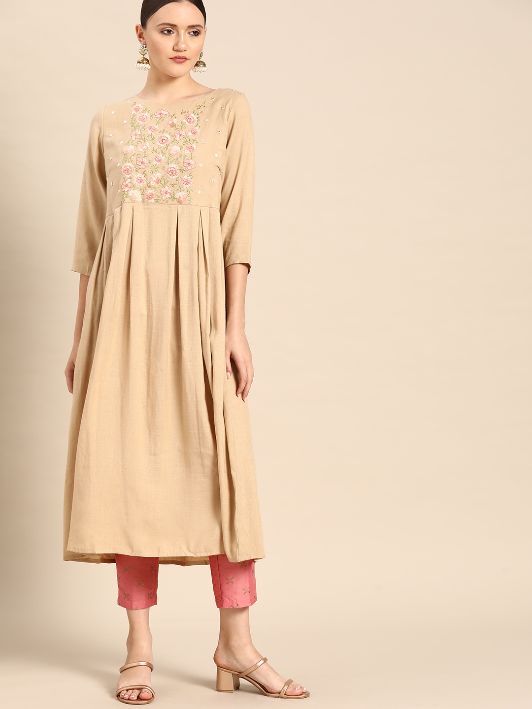 

Anouk Women Beige & Pink Floral Embroidered Yoke Design Mirror Work A-Line Kurta
