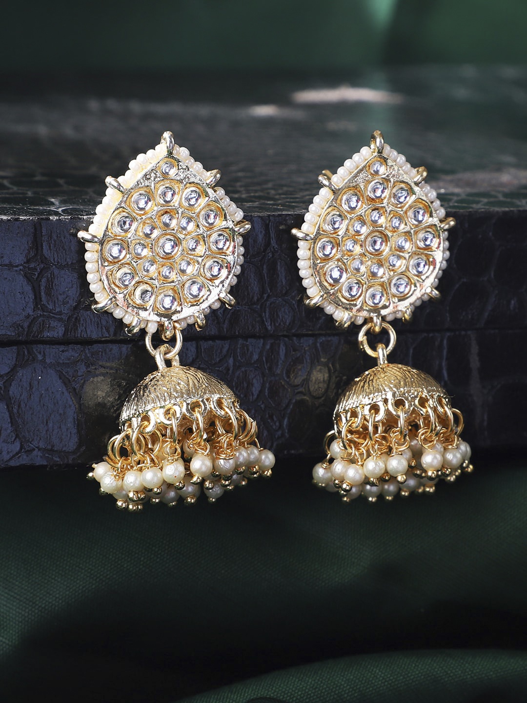 

ANIKAS CREATION Gold-Toned Dome Shaped Jhumka Earrings