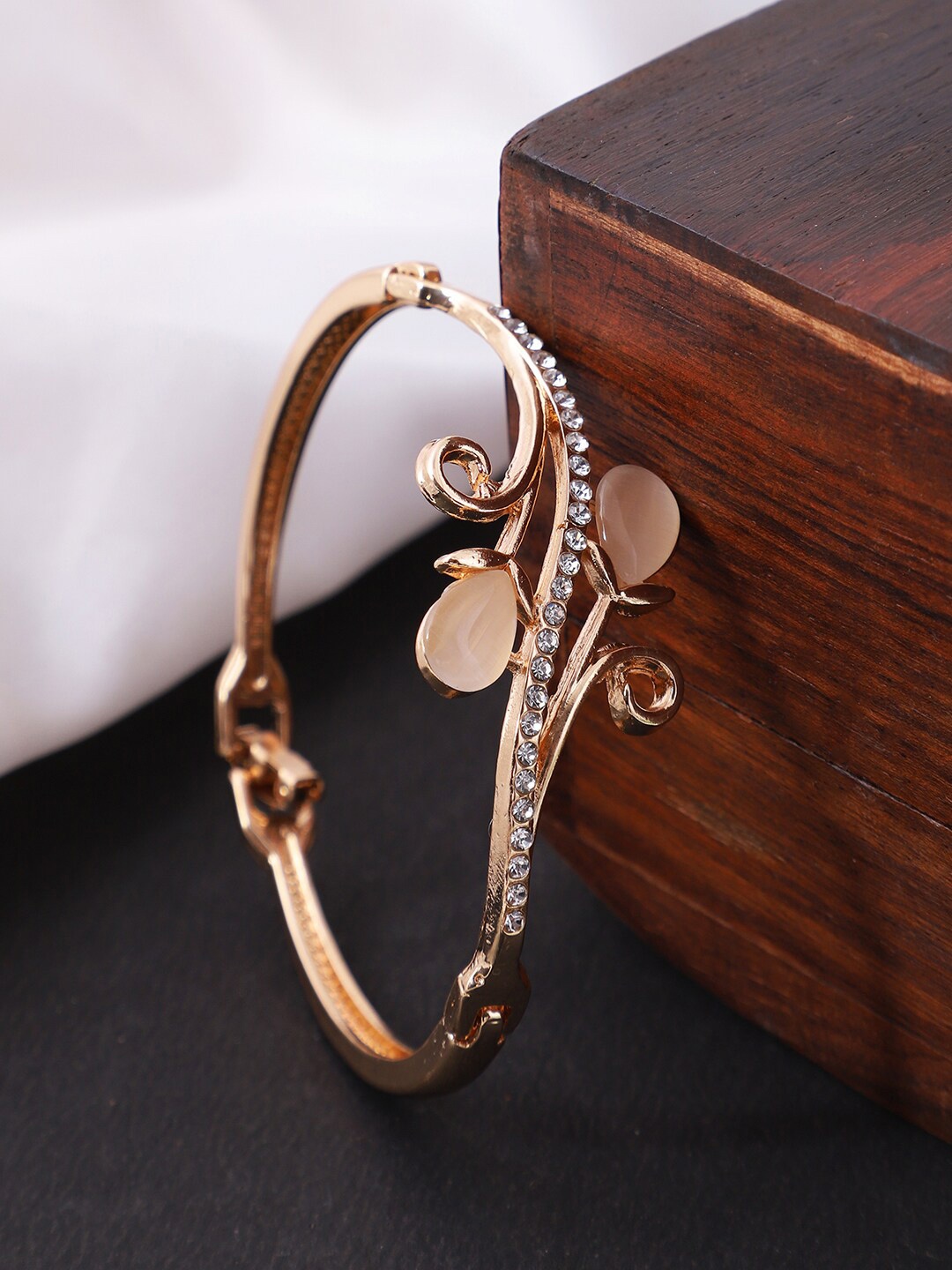 

ANIKAS CREATION Women Rose Gold-Toned & White Stone Handcrafted Bangle-Style Bracelet