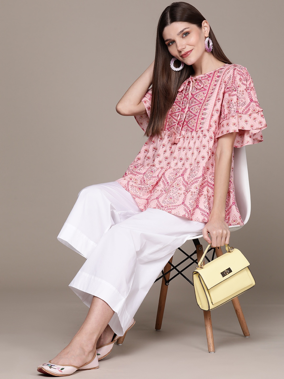 

aarke Ritu Kumar Pink Floral Tie-Up Neck Peplum Top