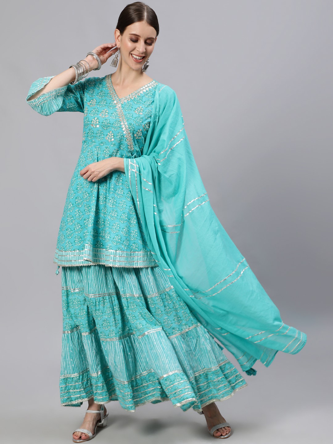 

Ishin Women Turquoise Blue Sequinned Pure Cotton Kurti With Sharara & Dupatta
