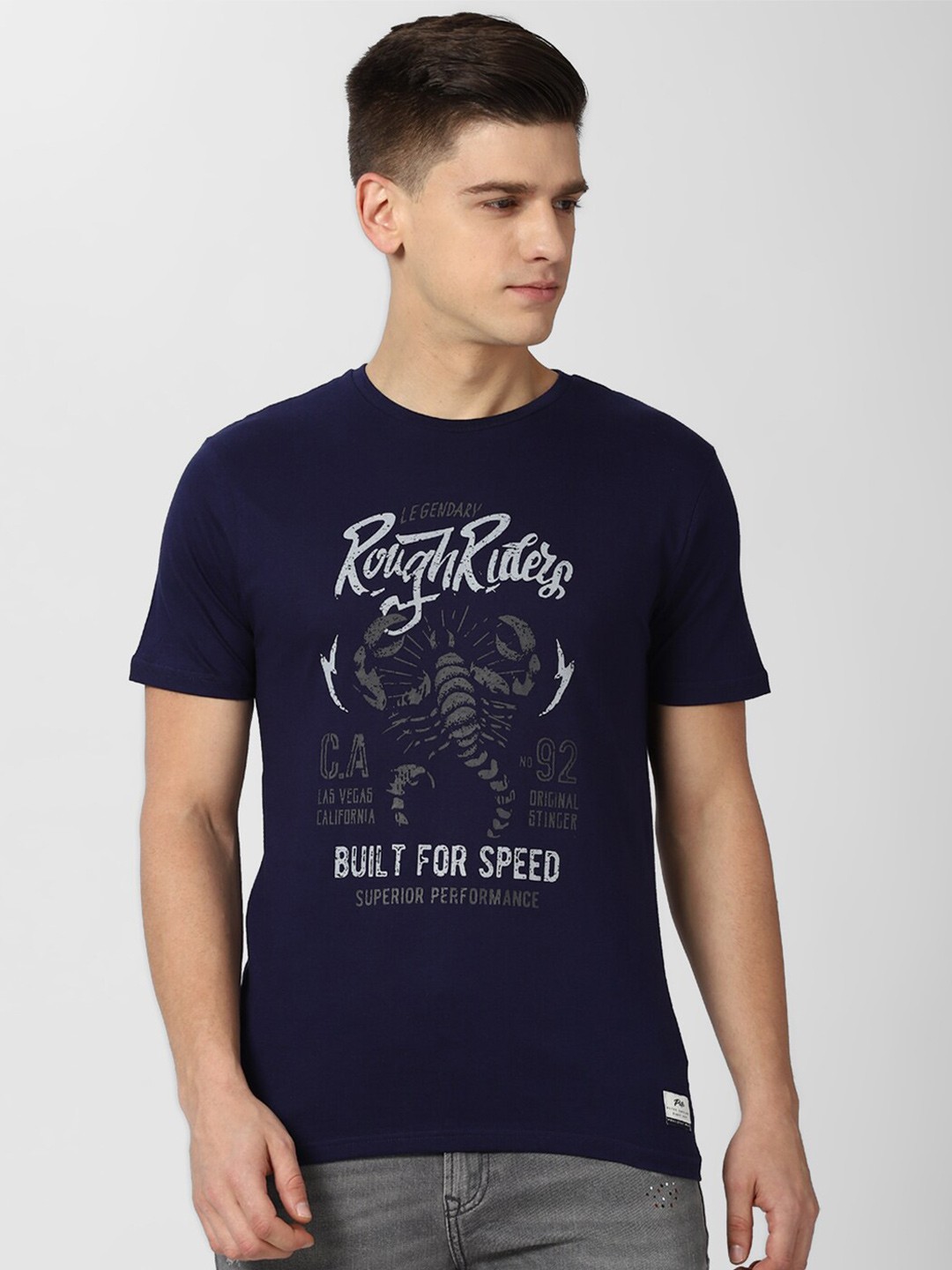 

Peter England Casuals Men Navy Blue White Typography Printed Pure Cotton T-shirt