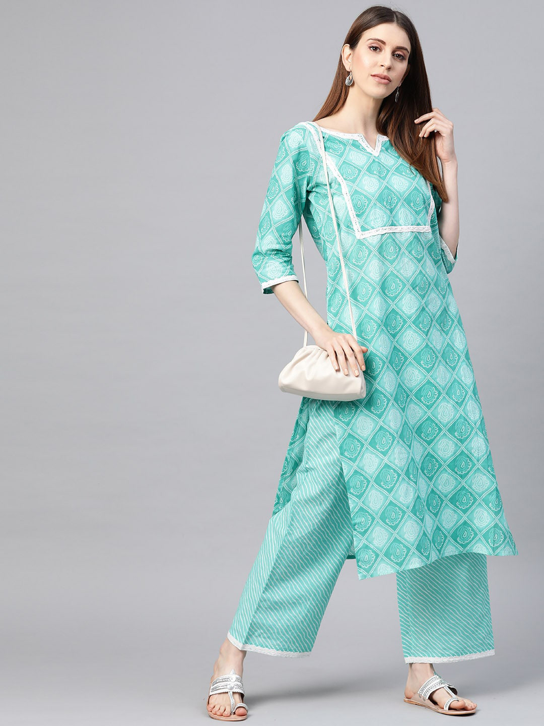 

Yuris Women Blue Ethnic Motifs Printed Regular Pure Cotton Kurta with Palazzos