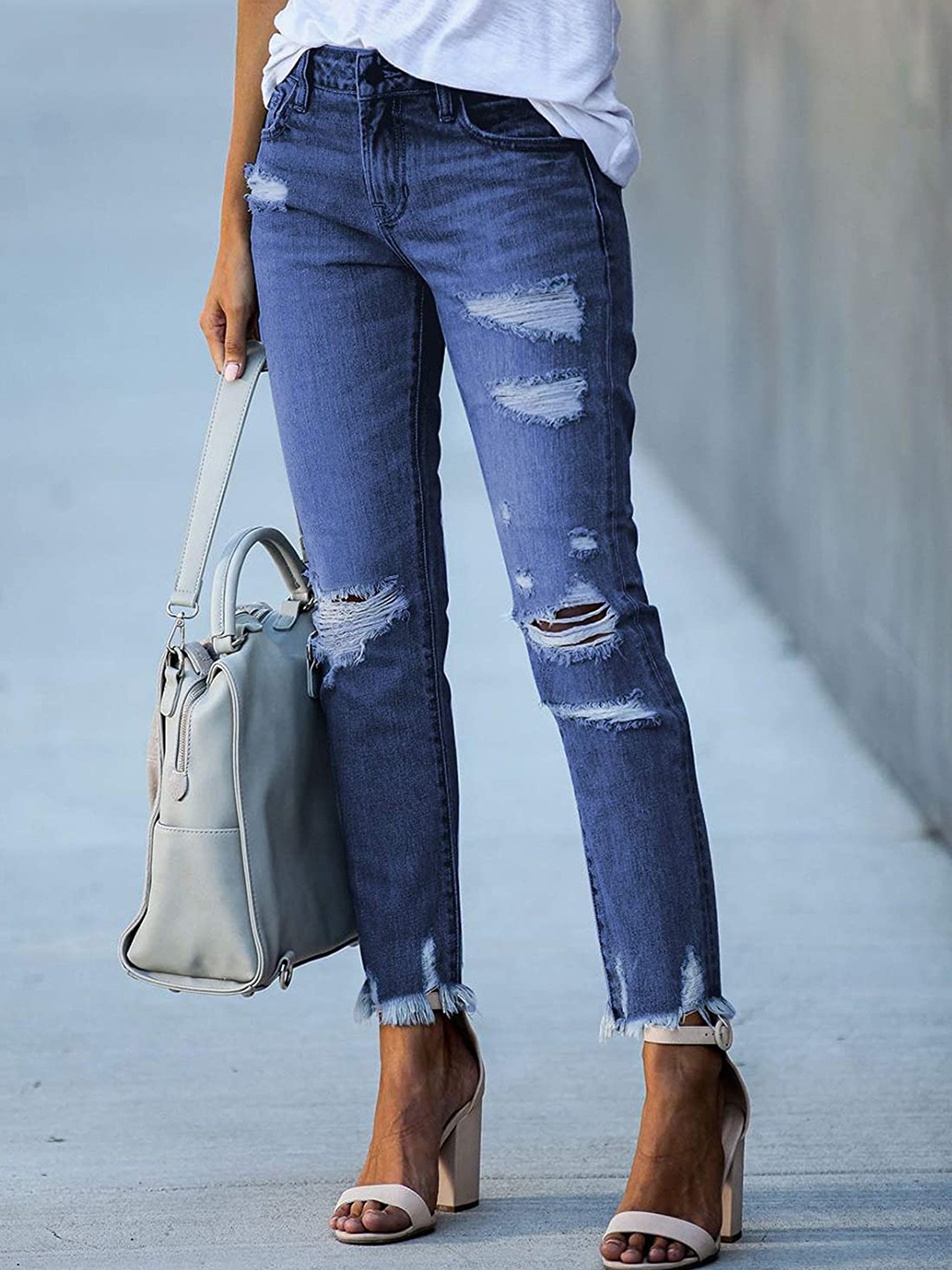 

URBANIC Women Blue Highly Distressed Ripped Jeans