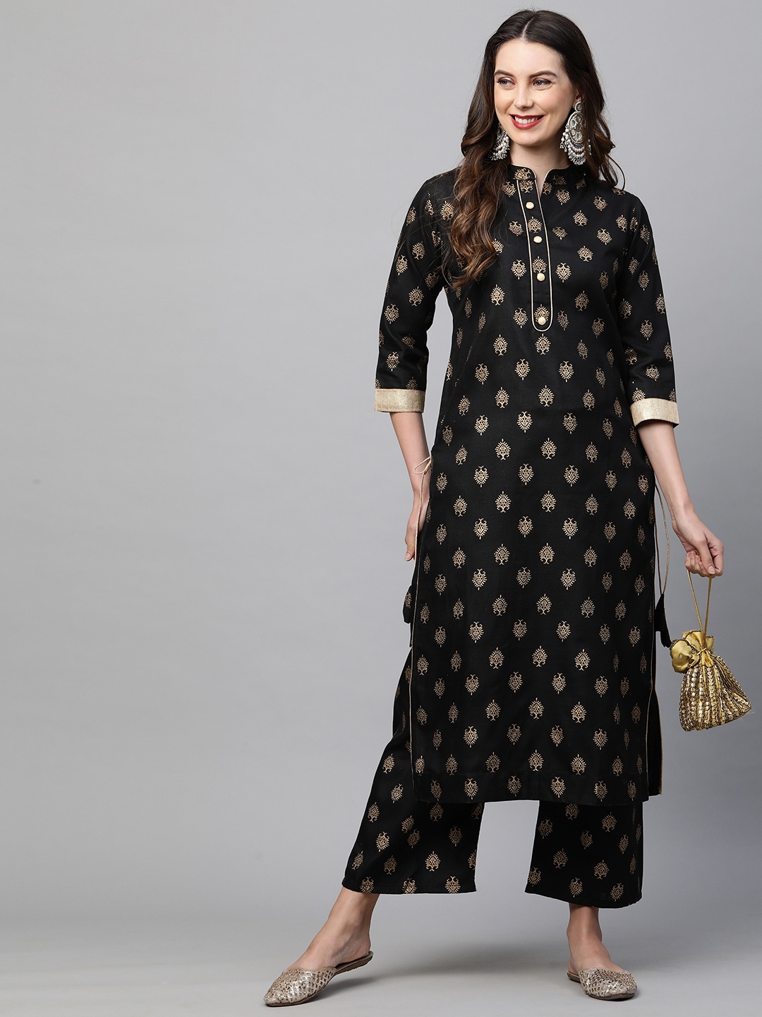 

GoSriKi Women Black Ethnic Motifs Printed Regular Kurta with Palazzos