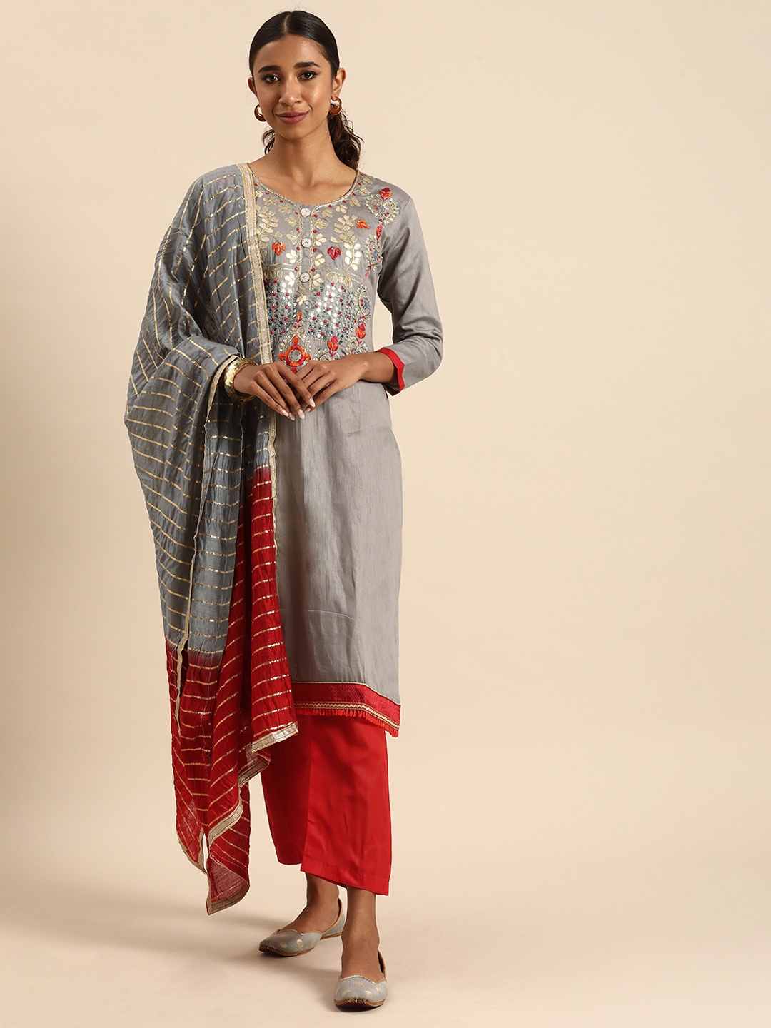 

Rajnandini Grey & Red Embroidered Unstitched Dress Material